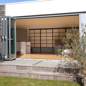 Aluminium bi-folding doors leading out onto the garden