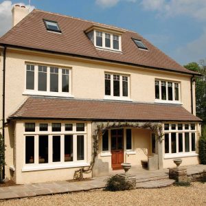 White aluminium casement window installation