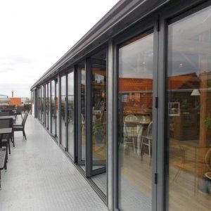 Grey aluminium bifold door installation