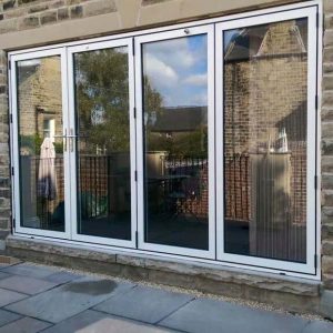 White aluminium bifold doors installation